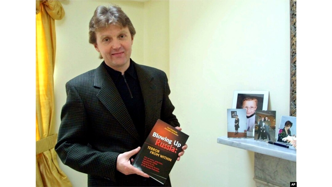 FILE - Alexander Litvinenko, former KGB spy and author of the book "Blowing Up Russia: Terror From Within," is photographed at his home in London, May 10, 2002.