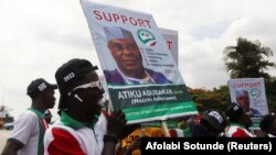FILE: Supporters of Former Vice-President Atiku Abubakar campaign during the special national convention of the People's Democratic Party in Abuja, Nigeria May 28, 2022.