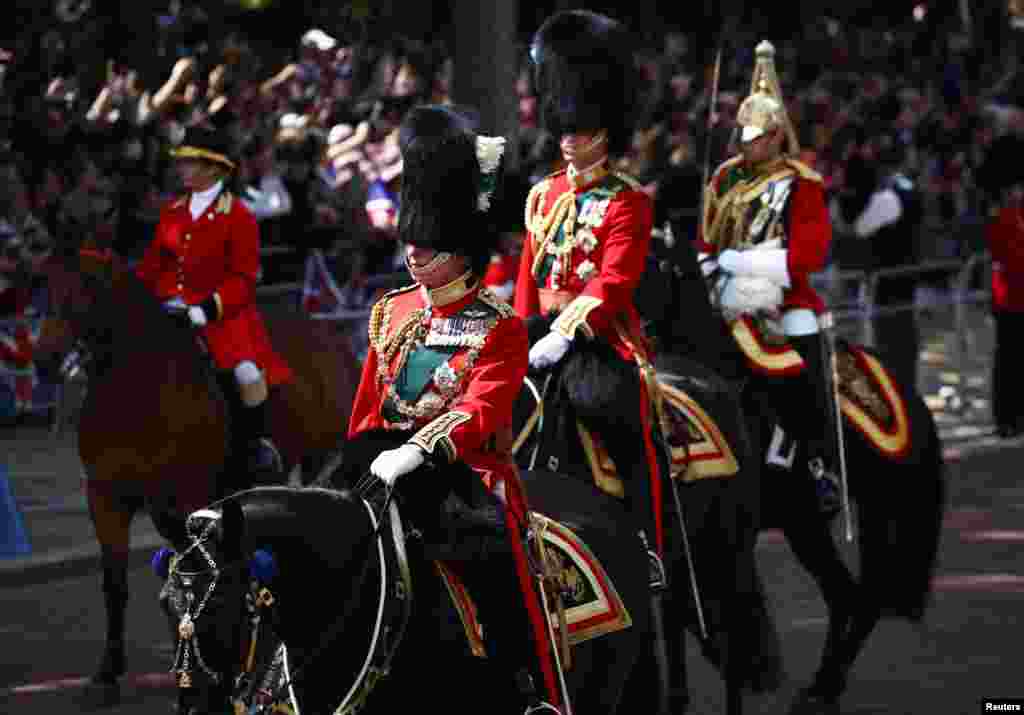 Britain&#39;s Prince Charles and Prince William ride on horseback during the Trooping the Color parade in celebration of Britain&#39;s Queen Elizabeth&#39;s Platinum Jubilee, in London, June 2, 2022.