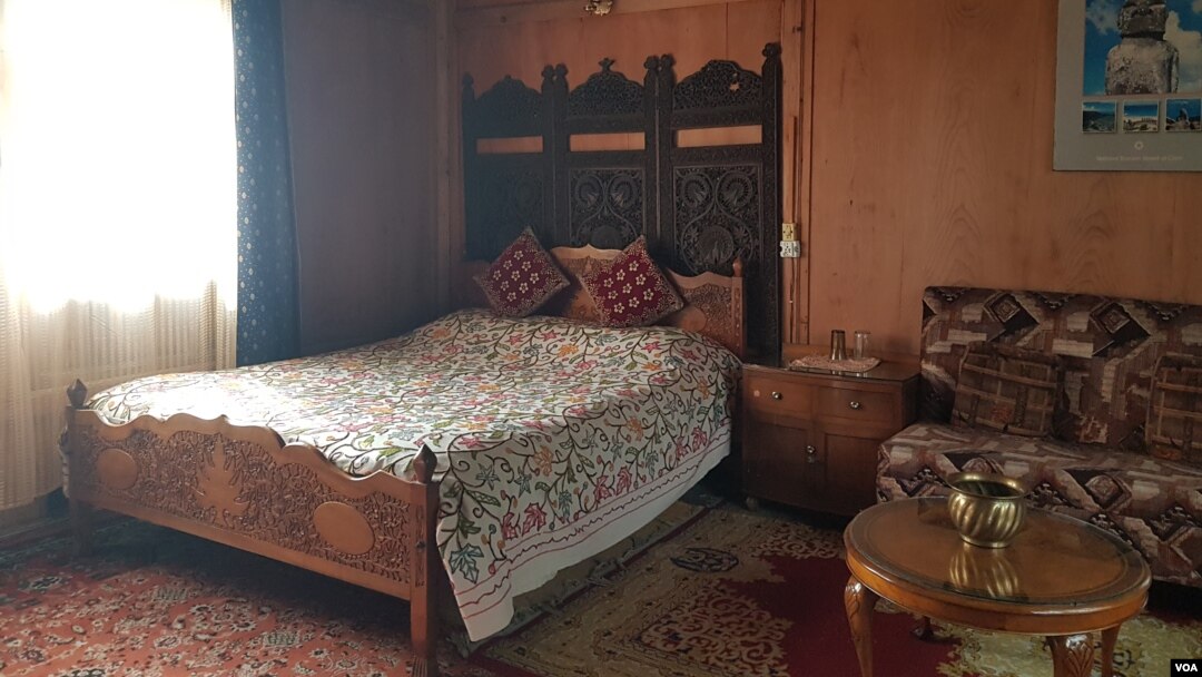 A bedroom inside a houseboat on Kashmir's Nigeen Lake. (Bilal Hussain/VOA)