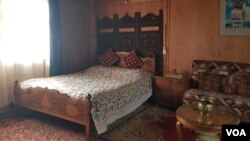 A bedroom inside a houseboat on Kashmir's Nigeen Lake. (Bilal Hussain/VOA)