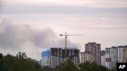 Smoke rises after Russian missile strikes in Kyiv, Ukraine, June 5, 2022. 