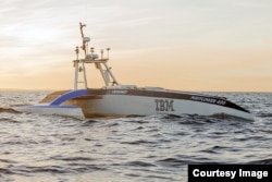 The Mayflower Autonomous Ship is seen in waters in the Atlantic Ocean during its attempt to sail without any captain or crew aboard from Britain to North America. (Image Credit: IBM)