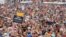People participate in the March for Our Lives, one of a series of nationwide protests against gun violence, on the National Mall in Washington, June 11, 2022. 