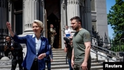 Ukraine's President Volodymyr Zelenskiy welcomes European Commission President Ursula von der Leyen before a meeting, as Russia's attack on Ukraine continues, in Kyiv, Ukraine June 11, 2022.