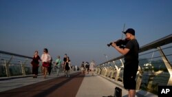 A street musician performs in Kyiv, Ukraine, June 10, 2022.