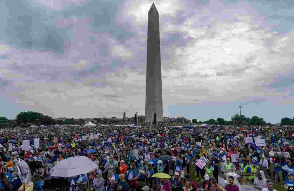 People participate in the second March for Our Lives rally in support of gun control in front of the Washington Monument, June 11, 2022, in Washington.