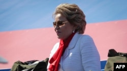 FILE - Valentina Matvienko, chairwoman of the Russian Federation Council, arrives to watch a military parade, which marks the 75th anniversary of the Soviet victory over Nazi Germany in World War II, at Red Square in Moscow, June 24, 2020. 