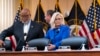 Members of the House select committee investigating the Jan. 6 attack on the U.S. Capitol, from left, Chairman Bennie Thompson, Rep. Adam Schiff, rear, and Vice Chair Liz Cheney, take their seats, at the Capitol in Washington, June 9, 2022.