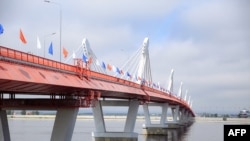A view of the first border bridge over the Amur (Heilongjiang) river linking the Russian city of Blagoveshchensk and the Chinese city of Heihe during its inauguration ceremony on June 10, 2022.