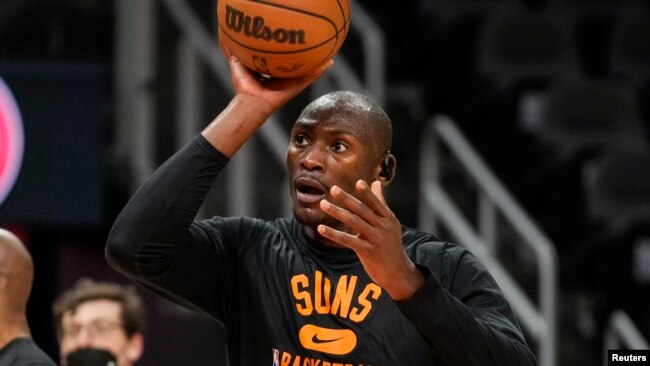 Phoenix Suns center Bismack Biyombo (18) warms up on the court prior to the game against the Atlanta Hawks at State Farm Arena in Atlanta, Georgia, Feb 3, 2022.