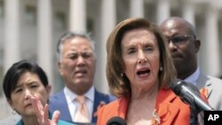House Speaker Nancy Pelosi, joined by other Democratic lawmakers, during a news conference on Capitol Hill on Wednesday, June 8, 2022, in Washington. (AP Photo/Manuel Balce Ceneta)