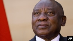 South Africa President Cyril Ramaphosa looks on during a media conference at the Union Building in Pretoria, May 24, 2022. Ramaphosa is facing a criminal investigation after a revelation that he failed to report the theft of about $4 million in cash from his farm.