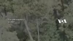Helikopter Jatuh di Timika, Satu Balita Terlempar - Hilang