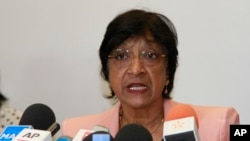 FILE - In this May 29, 2014 file photo, the then U.N. Human Rights Commissioner Navi Pillay speaks during a press conference in Rabat, Morocco.
