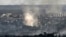 Smoke rises from shelling in the city of Sievierodonetsk during fighting between Ukrainian and Russian troops in the eastern Ukrainian region of Luhansk, June 7, 2022.