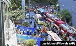 Des secouristes sur les lieux d'un incendie meurtrier à Daegu, en Corée du Sud, jeudi 9 juin 2022.