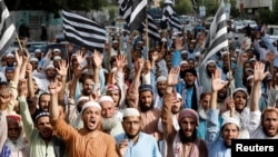 Supporters of the Jamiat Ulema-e-Islam-Fazal (JUI-F) religious and political party chant slogans against members of the Indian Bharatiya Janata Party, after their blasphemous comments on Prophet Mohammed, during a protest in Karachi, Pakistan, June 6, 2022.