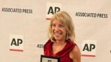 VOA journalist Carolyn Presutti with her award at the 2022 CAPBA ceremony. 