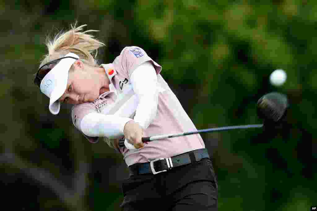 Brooke Henderson of Canada hits off the 10th tee during the first round of the KPMG Women&#39;s PGA Championship golf tournament in Chaska, Minnesota.