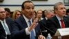 United Airlines CEO Oscar Munoz, left, accompanied by United Airlines President Scott Kirby, appears on Capitol Hill in Washington, May 2, 2017, to testify before a House Transportation and Infrastructure Committee oversight hearing. 