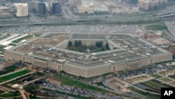 FILE - This March 27, 2008, file photo, shows the Pentagon in Washington. The U.S. Army is slashing the size of its force by about 24,000, which is nearly 5%.