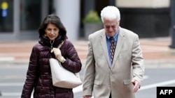 Diane and John Foley, the parents of James Foley, return to the Alexandria federal court house after a break in the trial of IS member El Shafee Elsheikh, the 'Beatle' in Alexandria, Virginia, March 30, 2022. 