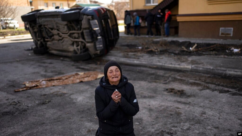 Tanya Nedashkivs'ka, 57, mourns the death of her husband, killed in Bucha, on the outskirts of Kyiv, Ukraine, Monday, April 4, 2022. Russia is facing condemnation after evidence emerged of what appeared to be deliberate killings of civilians in Ukraine. (AP Photo/Rodrigo Abd)