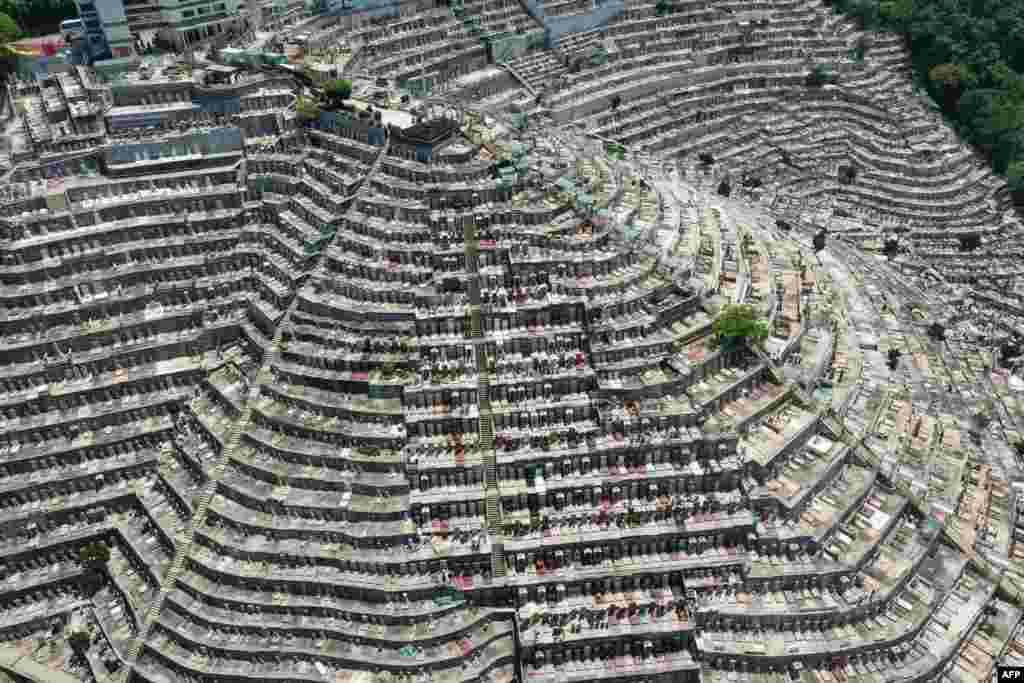 This aerial photo shows lines of graves at the Chinese Christian Cemetery on the western side of Hong Kong Island as people visit cemeteries to honor their ancestors during the annual Tomb Sweeping Day, known locally as Ching Ming.