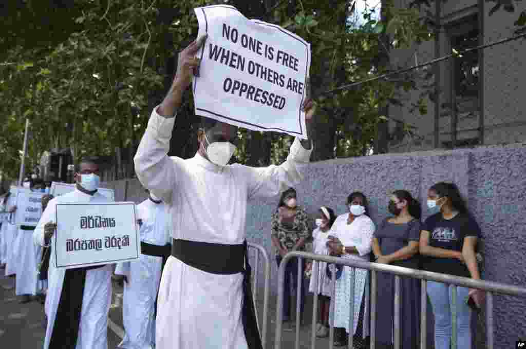 Catholic clergy protest against the economic crisis in Colombo, Sri Lanka.&nbsp;A group of Sri Lankan governing party lawmakers called for the appointment of an interim government as demonstrators continue to demand the resignation of President Mahinda Rajapaksa over the country&rsquo;s worst economic crisis in decades.