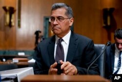 Health and Human Services Secretary Xavier Becerra arrives for a Senate Finance hearing on Capitol Hill, April 5, 2022.