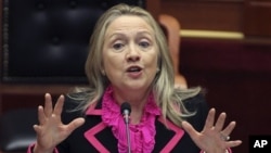 Secretary of State Hillary Rodham Clinton makes a speech at the Parliament in the capital Tirana, Albania.