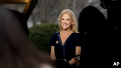 President Donald Trump's adviser Kellyanne Conway gets ready to speak on television outside the White House in Washington, D.C., Jan. 22, 2017.