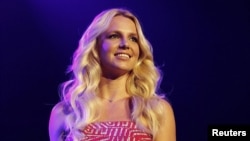 Britney Spears smiles on stage at the 2011 Wango Tango concert in Los Angeles, May 14, 2011