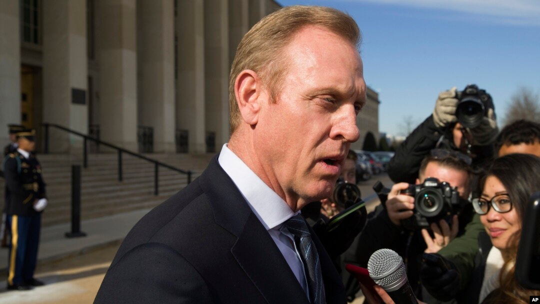 FILE - Acting Defense Secretary Pat Shanahan speaks with the media as he waits for the arrival of NATO Secretary General Jens Stoltenberg at the Pentagon in Washington, Jan. 28, 2019. 
