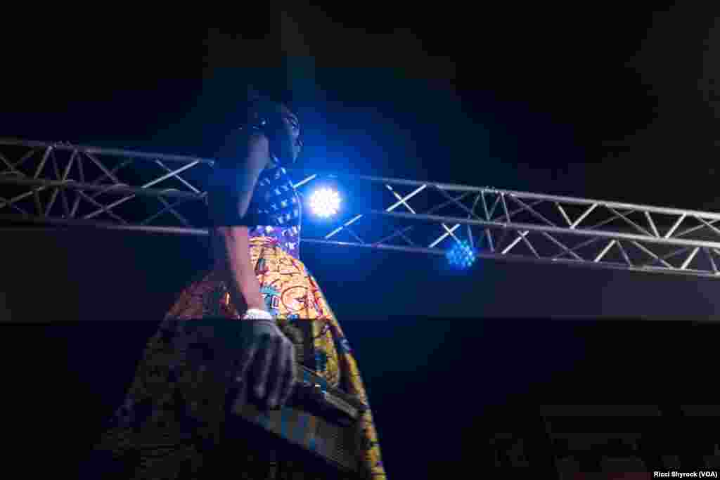 A model walks the catwalk at Dakar Fashion Week&#39;s &quot;Street Show,&quot; which is open to the public, June 29, 2017.