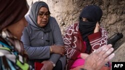 FILE: A member of a Women's rights group meets with women in the village of Tamarwoute, a remote part of Morocco's Anti-Atlas mountains. Taken Feb. 19, 2022. 