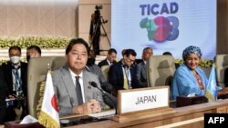 FILE - Japan's Foreign Minister Yoshimasa Hayashi and United Nations Deputy Secretary-General Amina J. Mohammed attend the opening session of the Tokyo International Conference on African Development (TICAD) in Tunisia, Aug. 27, 2022.