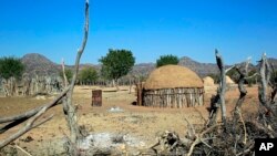 FILE: A Himba village stands empty near Okangwati, northern Namibia in this image taken Aug. 4, 2013. Namibia is a country prone to droughts, causing some of its people to be either severely or moderately food insecure. 