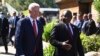 FILE - U.S. President Joe Biden speaks with South Africa President Cyril Ramaphosa during a G-7 summit in Cornwall, England, June 12, 2021.