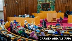 FILE: Senegalese deputies take part in the first parliamentary session since the July 2022 legislative elections, in Dakar. Taken September 12, 2022. 