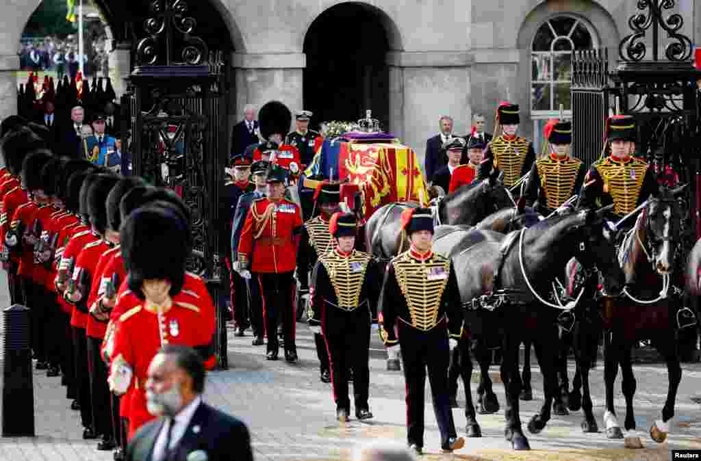 Royal guards march in the procession of the coffin of Britain&#39;s Queen Elizabeth II in London, Sept. 14, 2022.