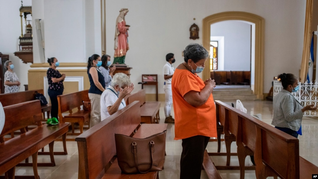 FILE - Faithful attend a Mass at the Cathedral in Matagalpa, Nicaragua, Aug. 19, 2022 after Nicaraguan police raided the residence of Matagalpa Bishop Alvarez, detaining him and other priests in an escalation of tensions between the Catholic church and Daniel Oretga's government.