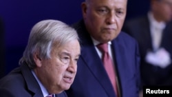 Egyptian Foreign Minister and Egypt's COP27 President Sameh Shoukry and United Nations Secretary General Antonio Guterres deliver statements on progress made on the penultimate day of COP27, in Sharm el-Sheikh, Egypt, November 17, 2022. 