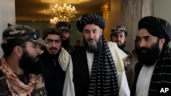 Bashir Noorzai, center, at his release ceremony at the Intercontinental Hotel, in Kabul, Afghanistan, Sept. 19, 2022. Noorzai, a notorious drug lord and member of the Taliban, told reporters that he spent 17 years and six months in a U.S. prison.