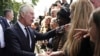 FILE - Britain's King Charles III meets the public near Lambeth Bridge in London, Sept. 17, 2022. Planning for the monarch's coronation next month is being met with subdued enthusiasm in Canada, the Commonwealth's largest country by area.