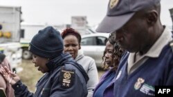 SAFRICA-MIGRATION-POLICE-afrique du sud