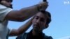 Iranians in Greece Cut Hair to Protest Iranian Woman’s Death 