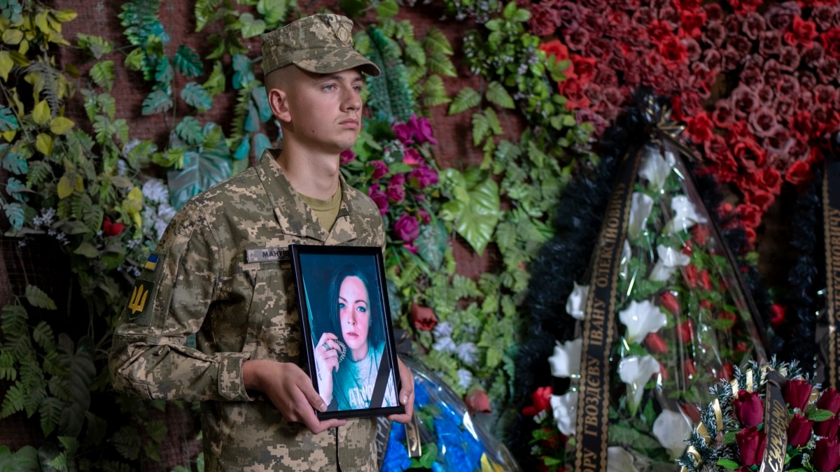 russian soldier war hero with a flag against the