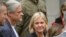 Swedish Prime Minister Magdalena Andersson and her husband, Richard Friberg, arrive to cast their votes at a polling center in Nacka, near Stockholm on September 11, 2022, during Sweden's general elections. 